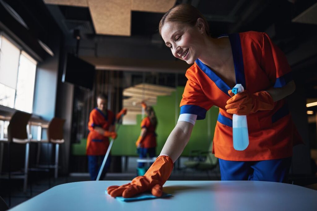 Licensed janitorial team performing window cleaning for businesses in Oxnard